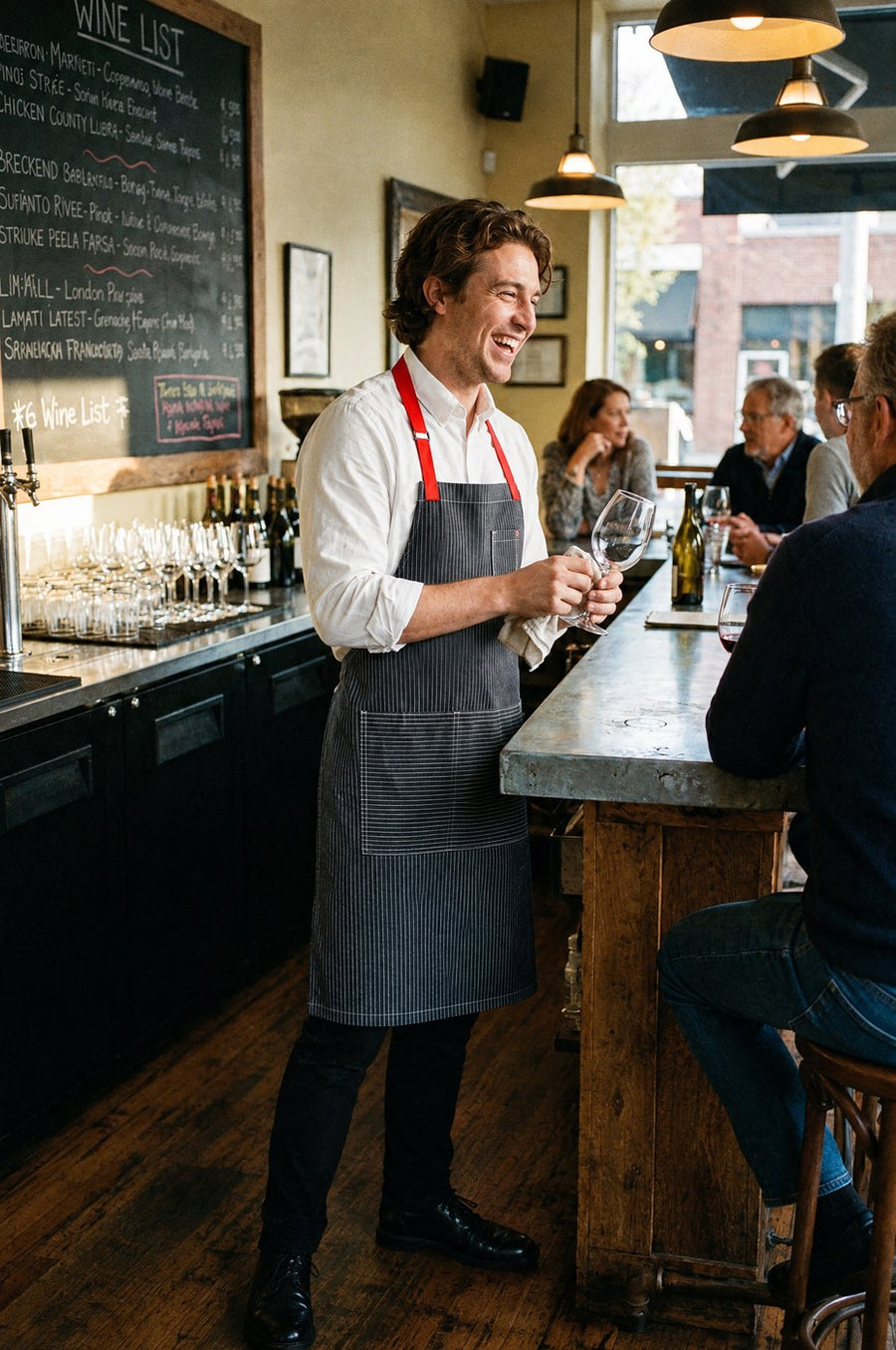 Wine bar regulars: restaurant staff in custom embroidered Pinstripe/Red Barcelona bib apron with logo