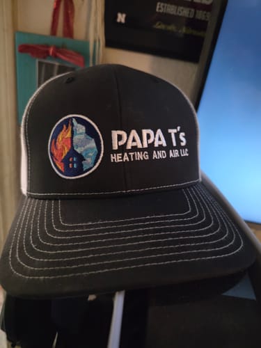 PAPA T's Heating and Air logo on a black trucker cap